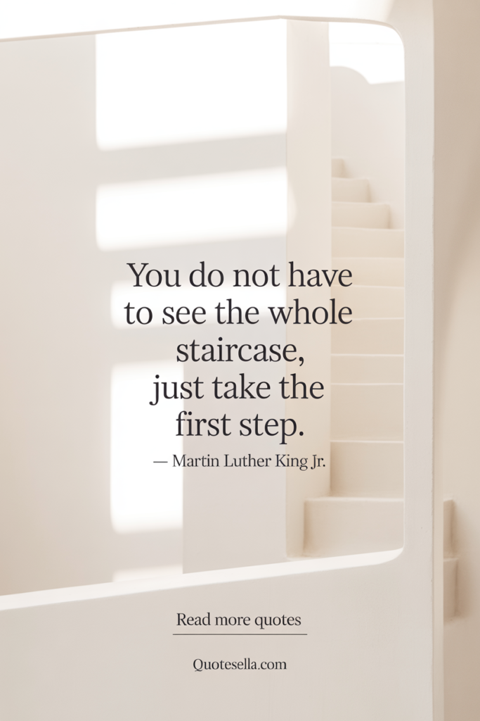 Inspirational quote by Martin Luther King Jr. reading “You do not have to see the whole staircase, just take the first step,” set against a soft neutral background with subtle staircase details and natural light.