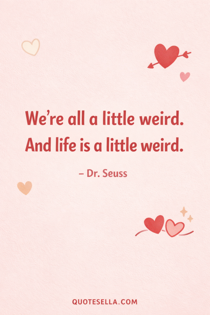 We’re all a little weird and life is a little weird Dr. Seuss quote on a soft pink Valentine’s Day background with hearts