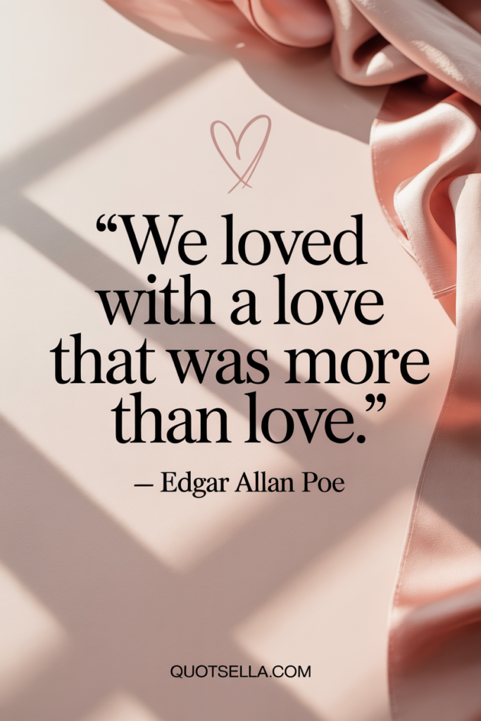 Romantic Valentine’s Day quote by Edgar Allan Poe reading “We loved with a love that was more than love,” styled with soft pink fabric, delicate heart accents, and elegant typography, Quotesella.com